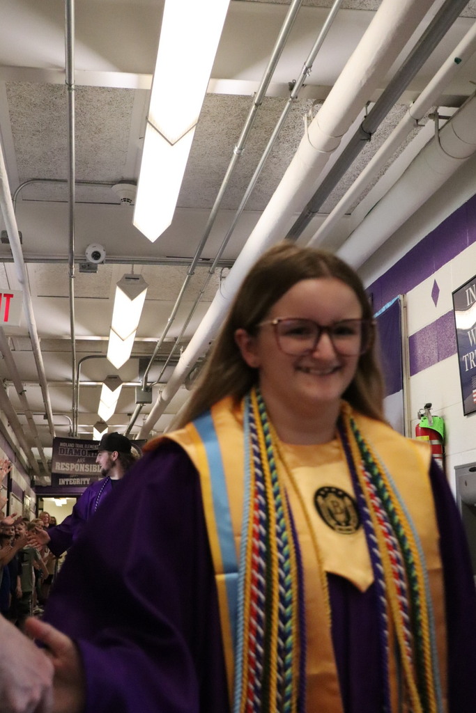 Students walking in hallway.