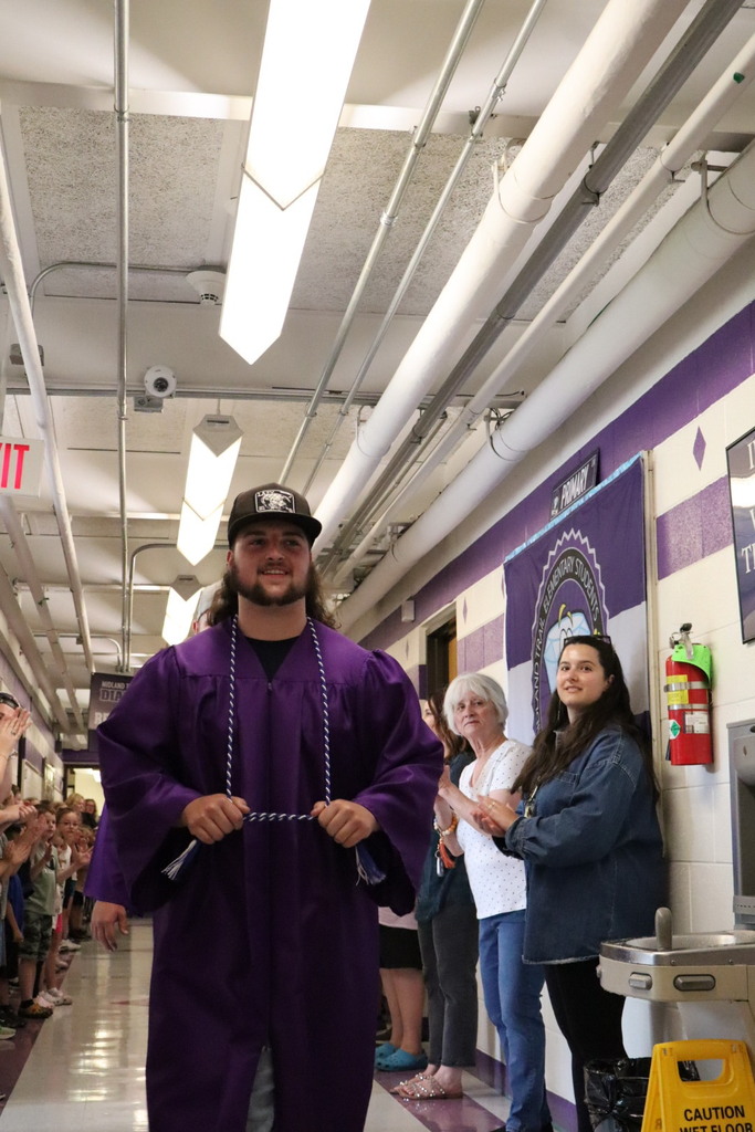 Students walking in hallway.
