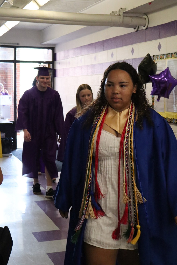 Students walking in hallway.