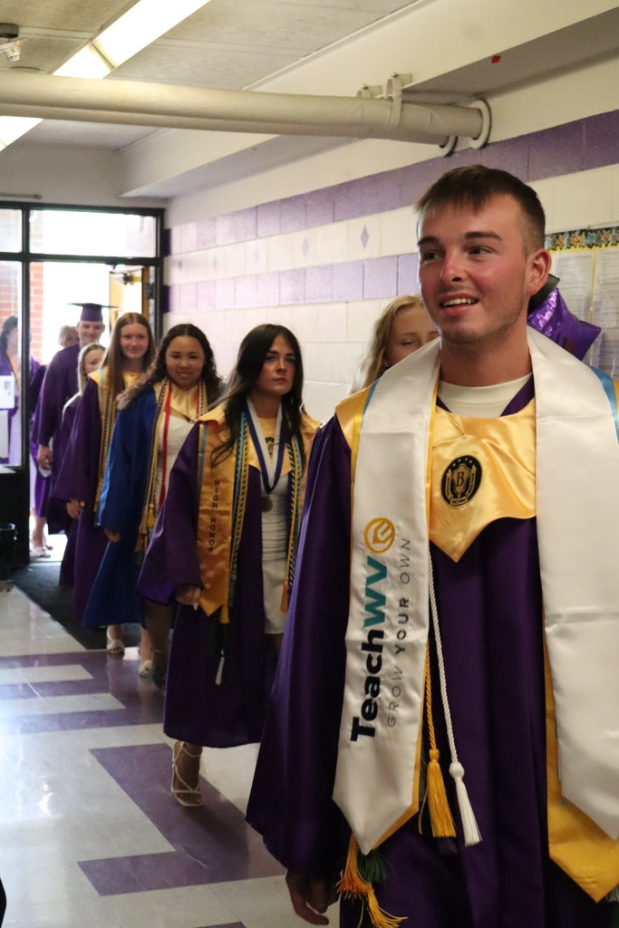 Students walking in hallway.