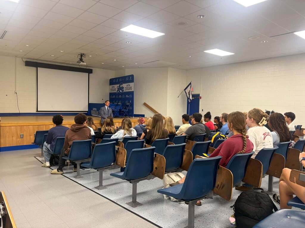 WVU President Michael Benson talking to Capital High School students in the school's reserve auditorium.