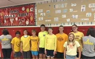 KCS students and staff wearing gold for childhood cancer awareness.