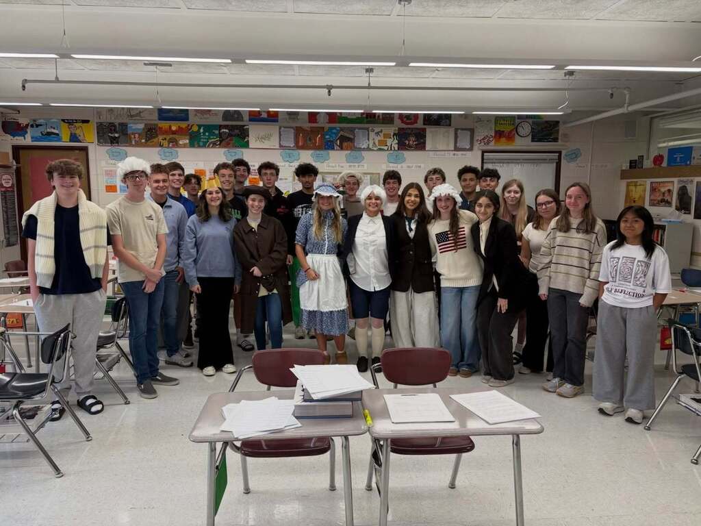 Students in their classroom dressed up as leaders from the  American Revolution.