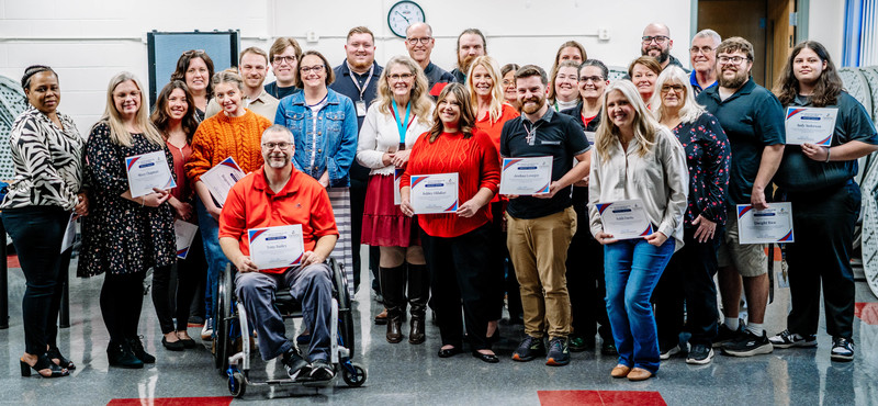 Group picture of teachers who were recognized for their students showing the most growth on the middle of the year benchmark tests.