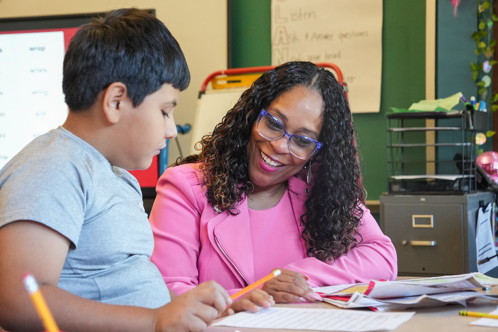 Dr. Collier with KCPS student.