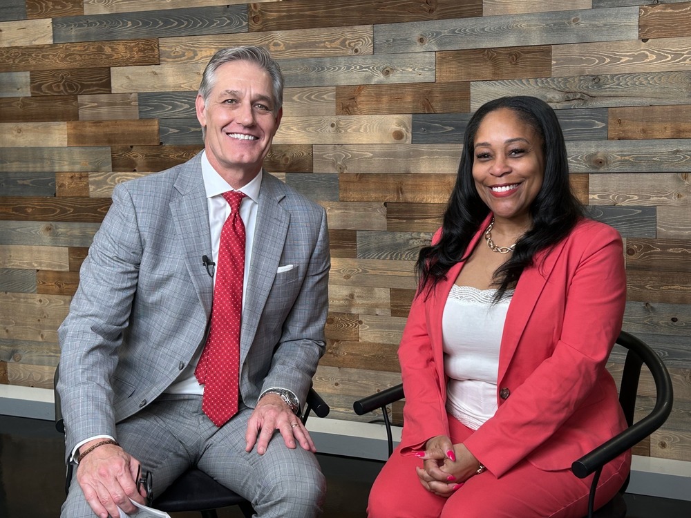 Superintendent Dr. Collier sitting with KCTV5 anchor Brad Stephens