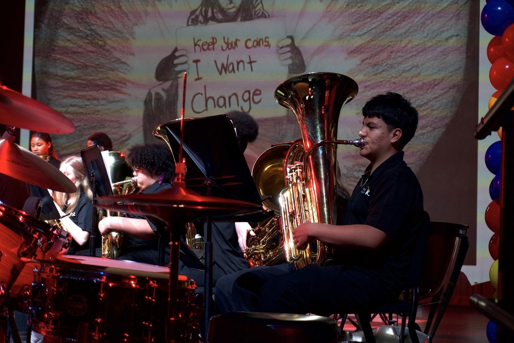 Student playing the horn at KCPS Fine Arts Festival.