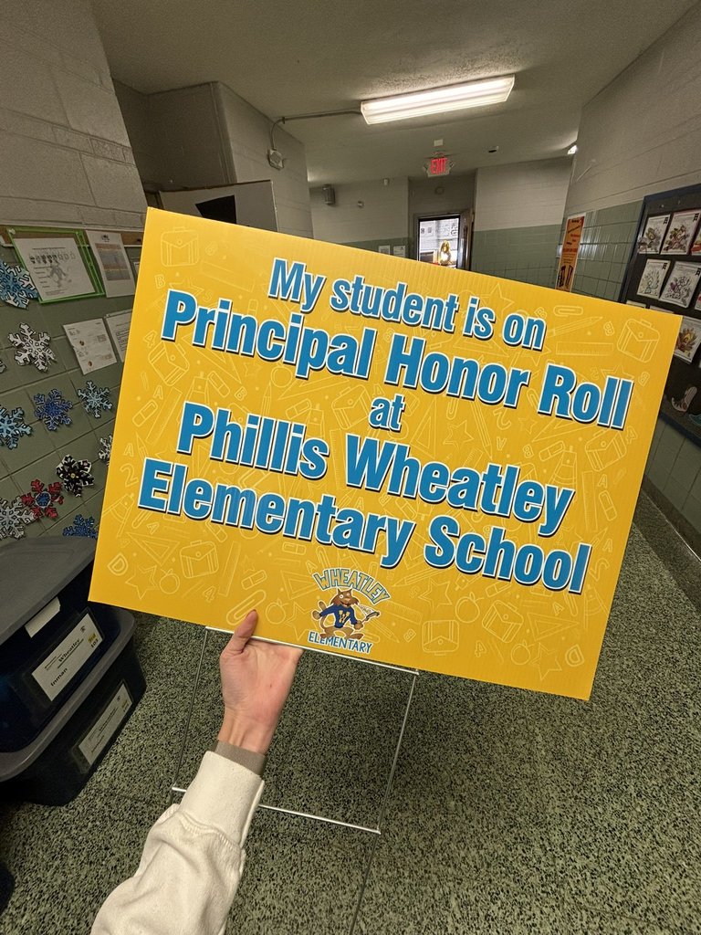 Yard sign reading "My student is on Principal Honor Roll at Phillis Wheatley Elementary School"