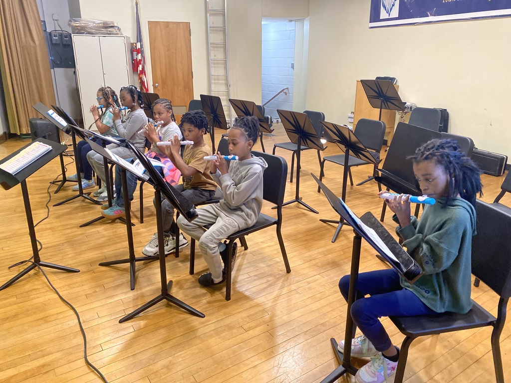 Band and Orchestra students playing wind instruments