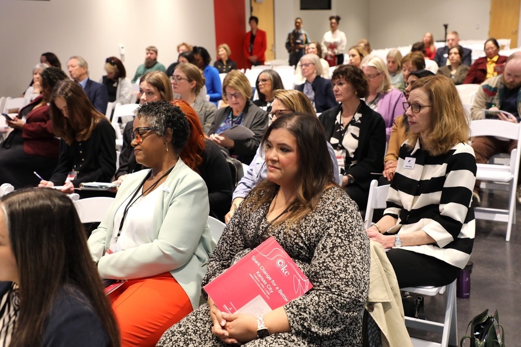 An audience listens to the C3KC education panel