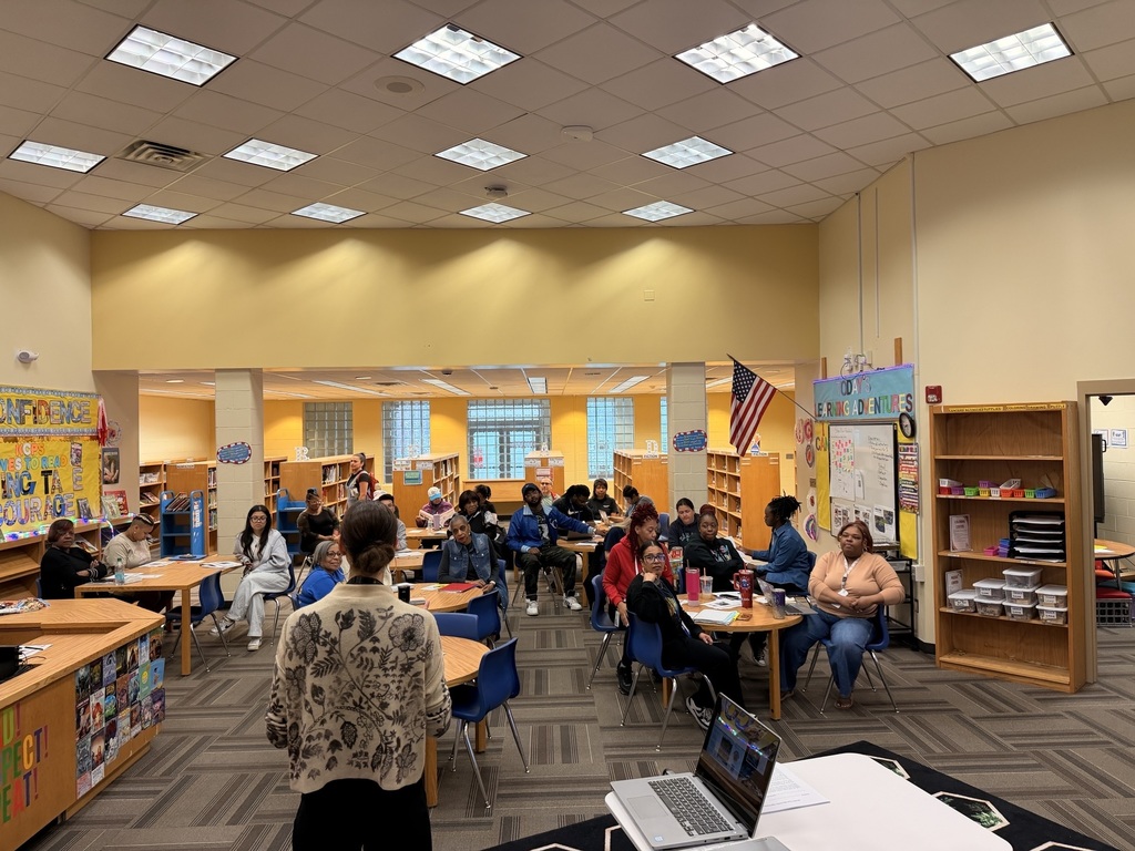 KCPS's Bond Engagement Team speaks to staff about upcoming renovations to their building