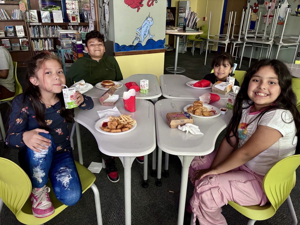 Students eating McDonalds to celebrate Principal's Honor Roll