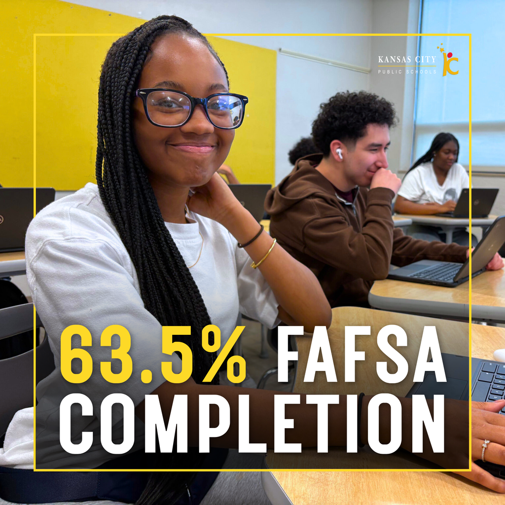 A high school girl sitting at a desk with a laptop in front of her smiles at the camera, and classmates are visible in the background completing their own work. Text overlaying the image states "63.5% FAFSA completion"