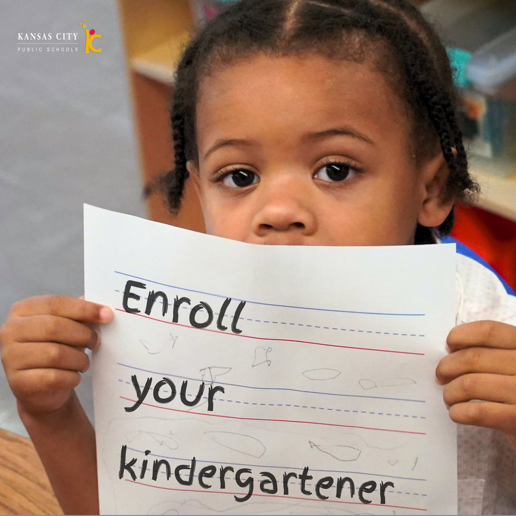 A young student holds up a piece of paper with a text overlay stating "enroll your kindergartener"