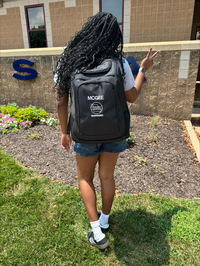Student Jada McGee with backpack with MSHSAA emblem.