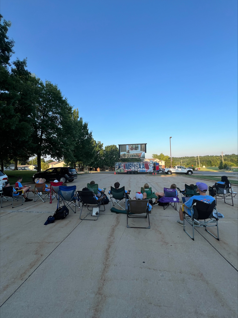 MSHSAA SACC members watching outside movie.