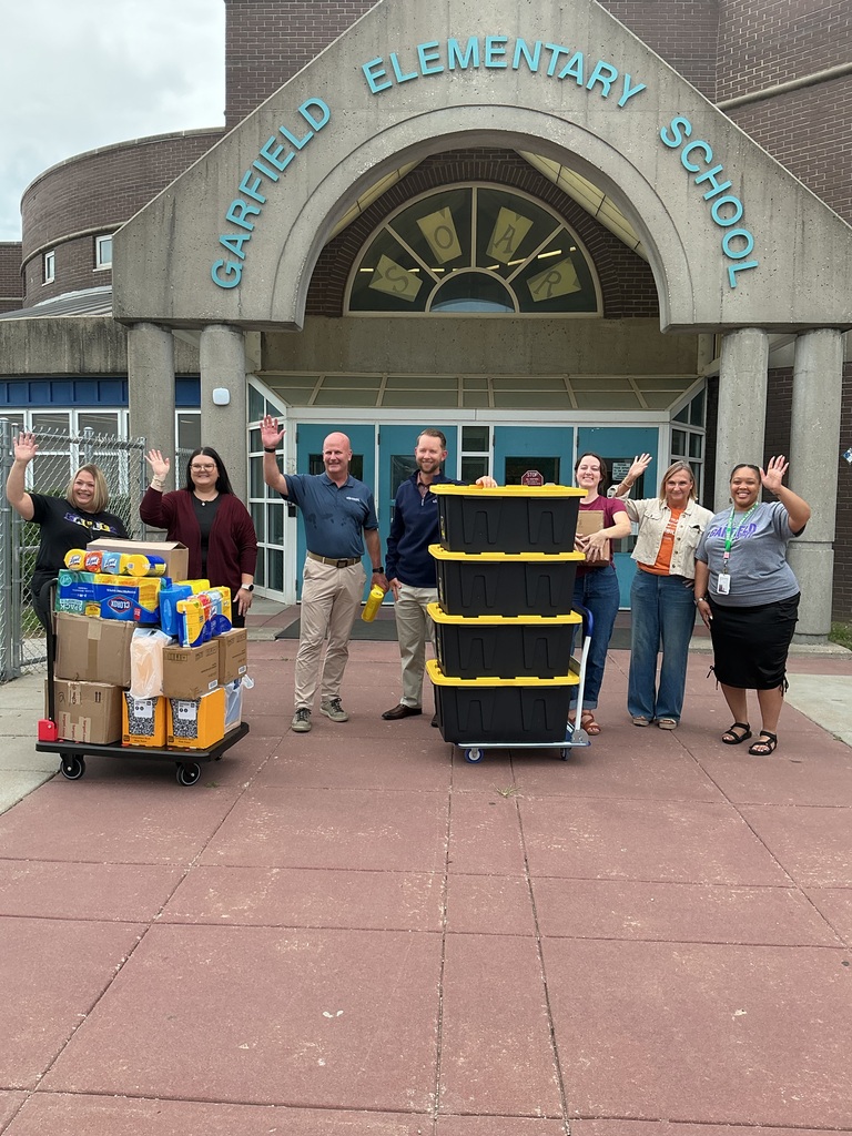 pictures of community partners with donations