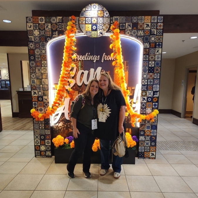 Mrs. Nuss and Mrs. Corn pose at the San Antonio Marriott