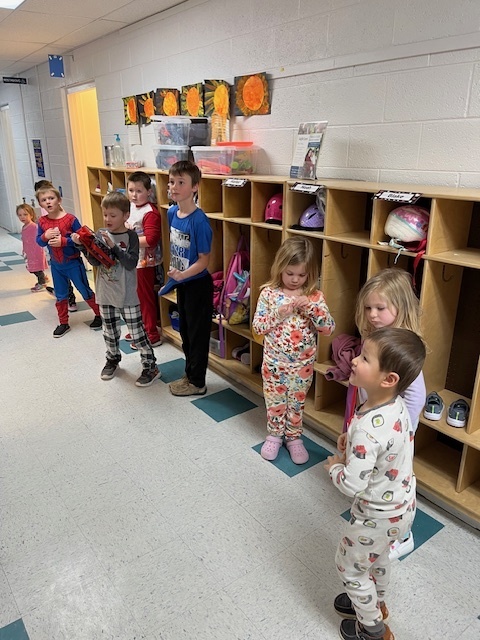 Elementary students sport pajamas in the hallway for FFA Week 2024.