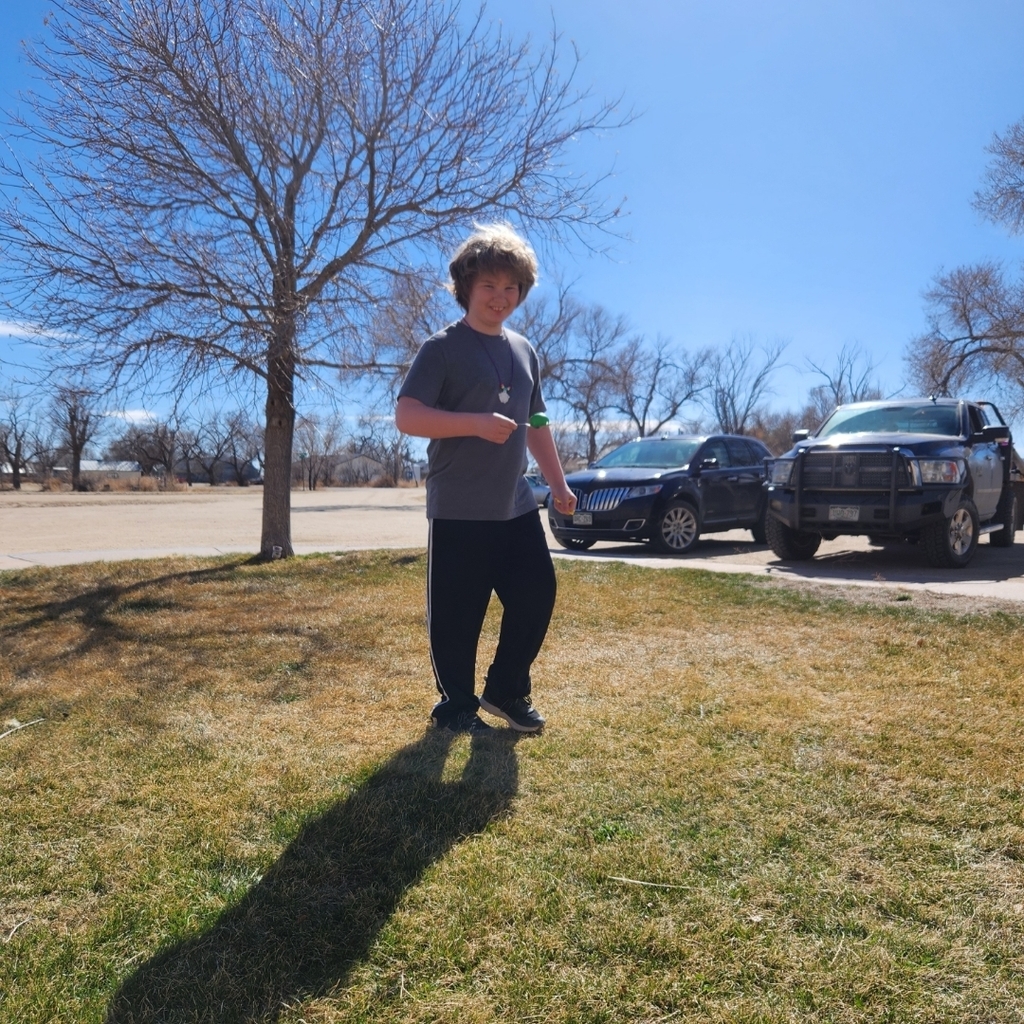 5th grader balances an egg on a spoon