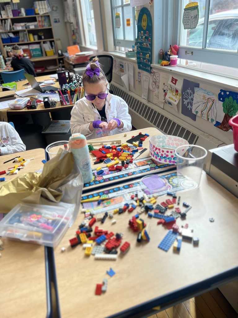 student counting legos