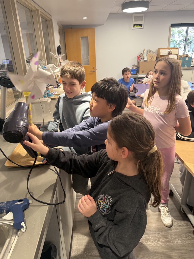 students making windmills standing 