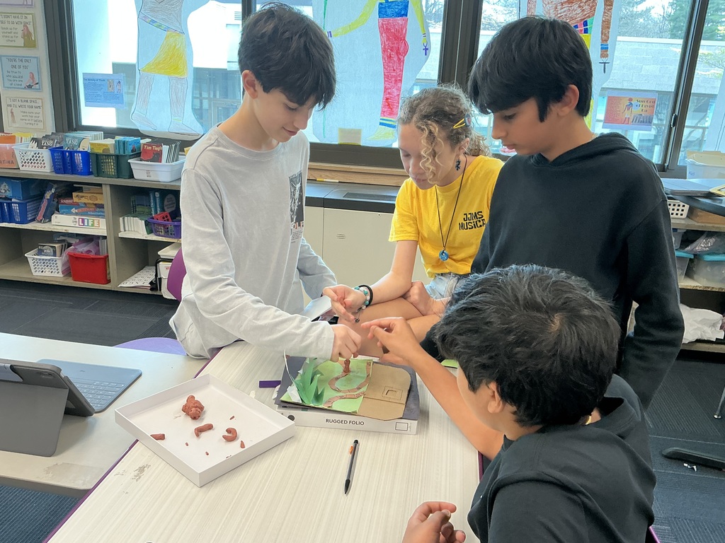 students standing playing games 