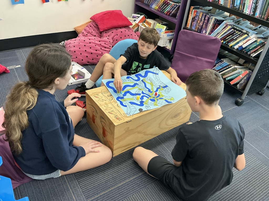 students sitting playing games 