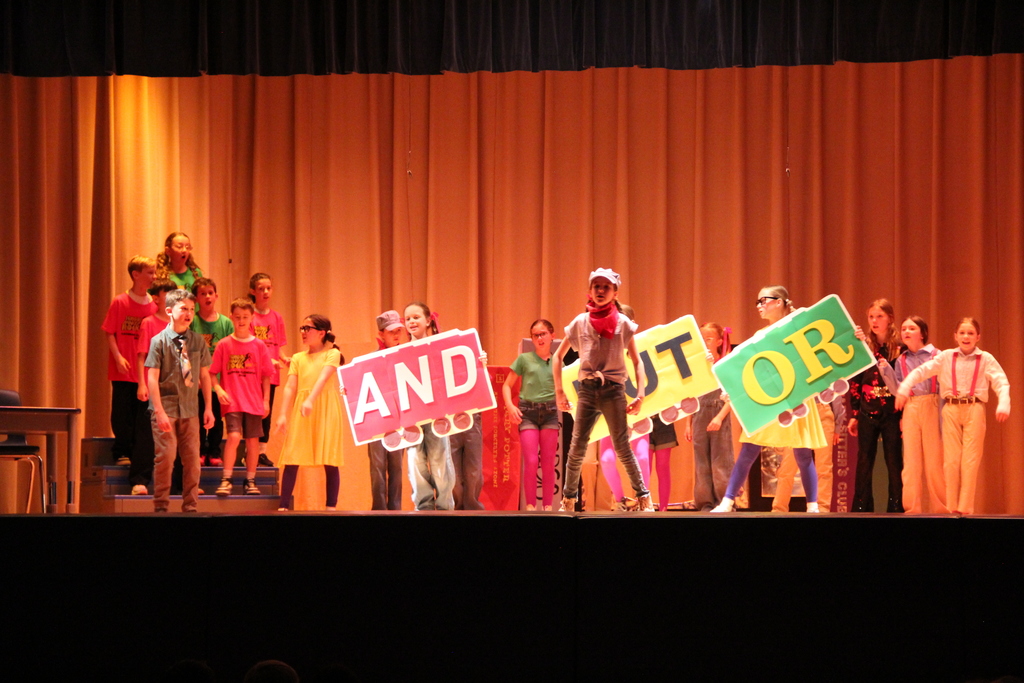 students dancing on stage