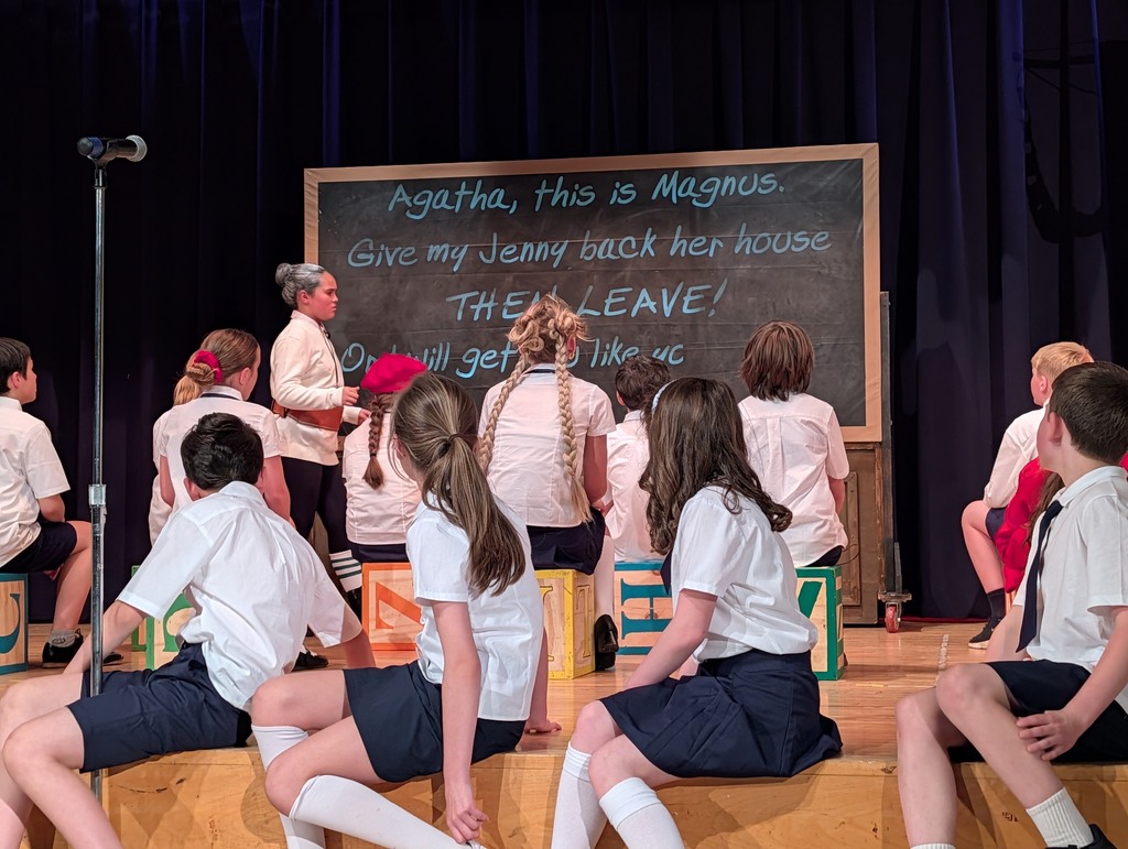 students on stage 