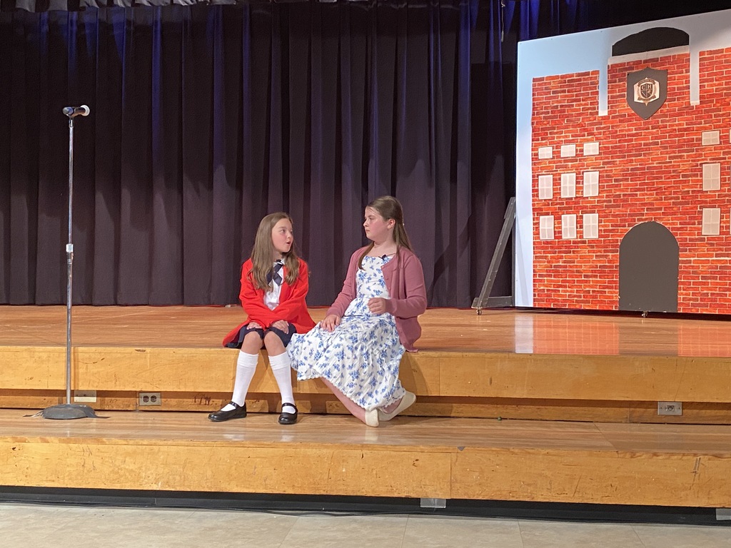 students on stage 
