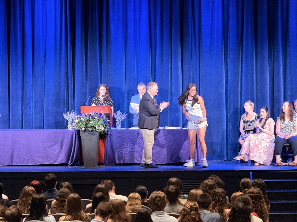 students on stage 