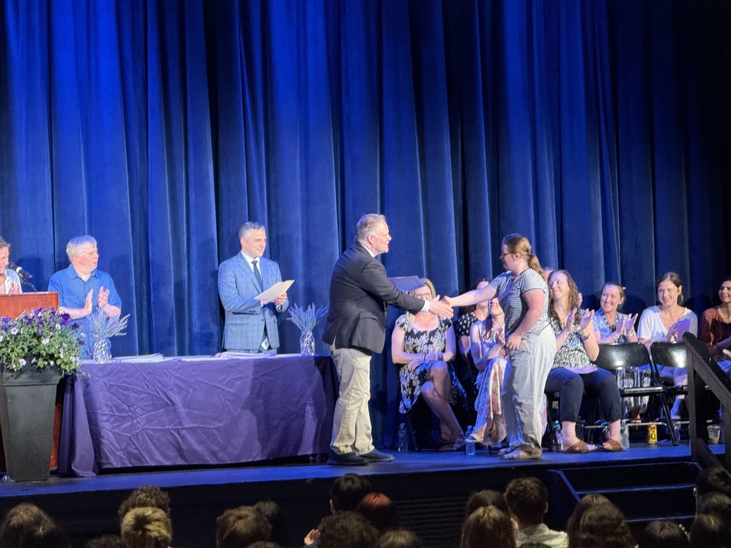 students on stage 