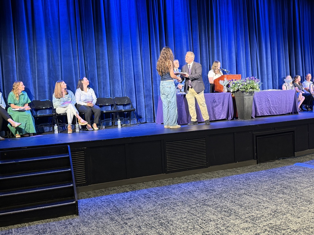 students on stage 
