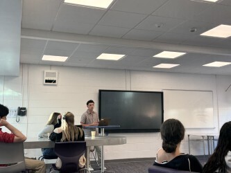 student standing talking