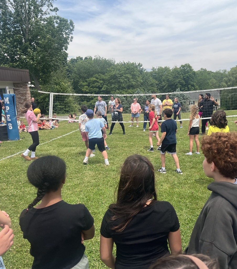 students playing volleyball