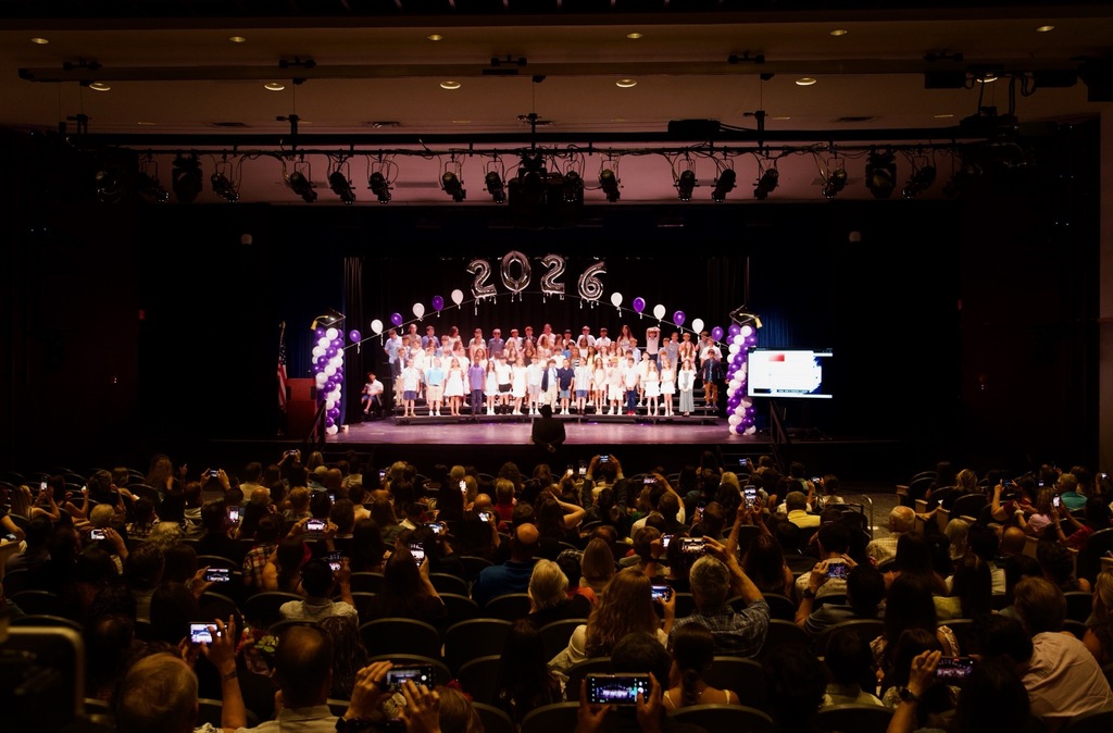 students on stage