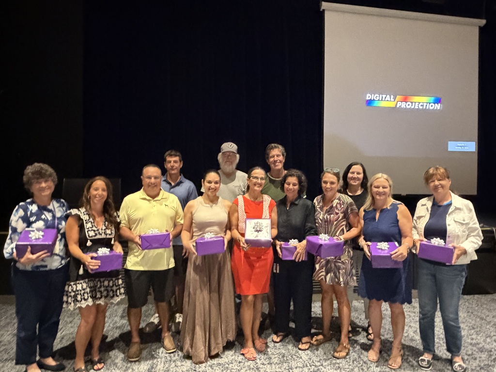 teachers and staff standing