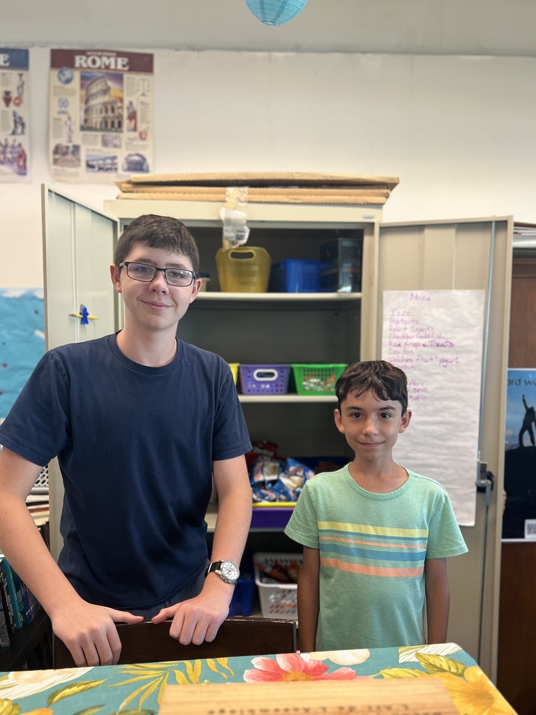 students standing in classroom