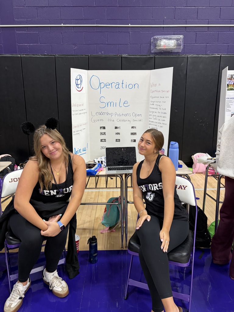 students sitting in chairs 