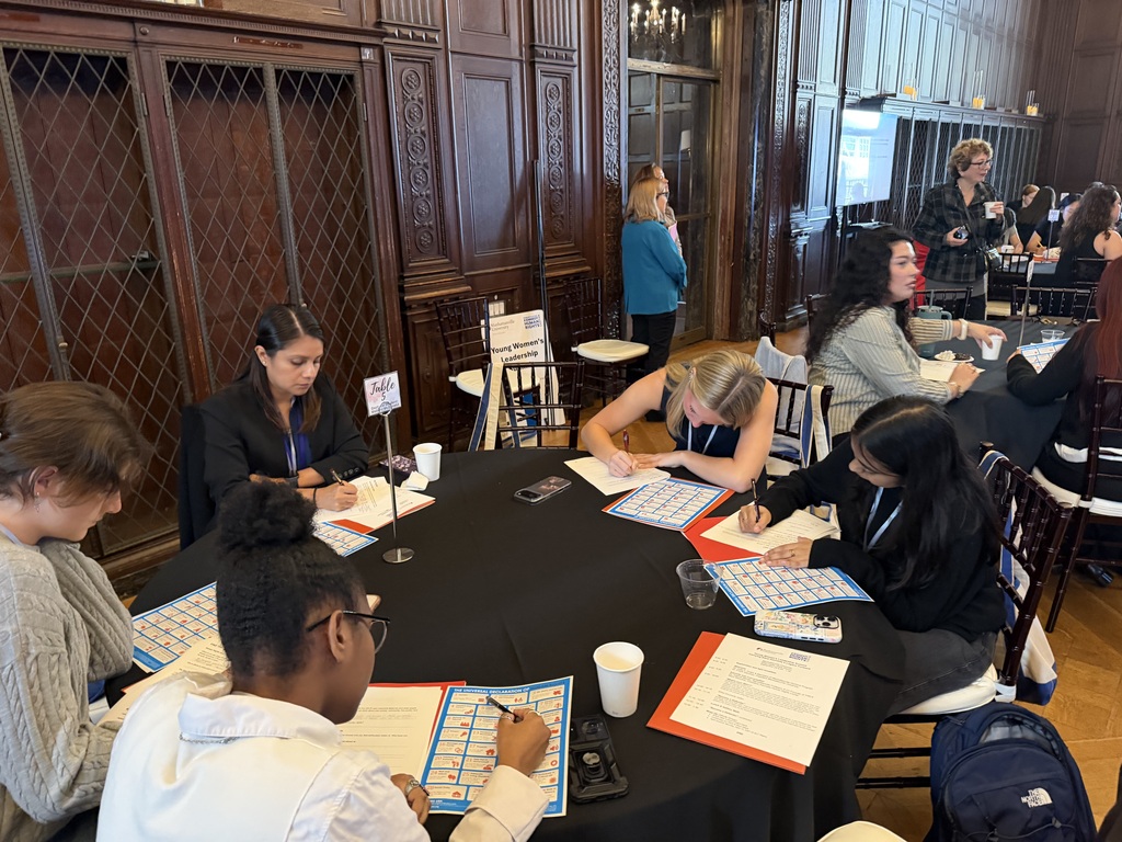 students sitting at table