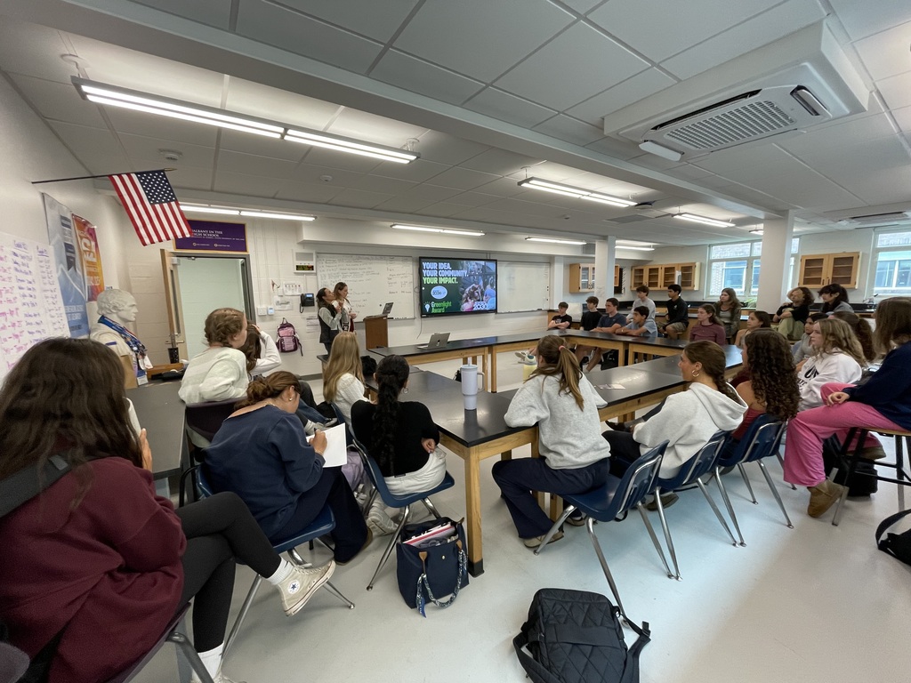 students sitting at tables