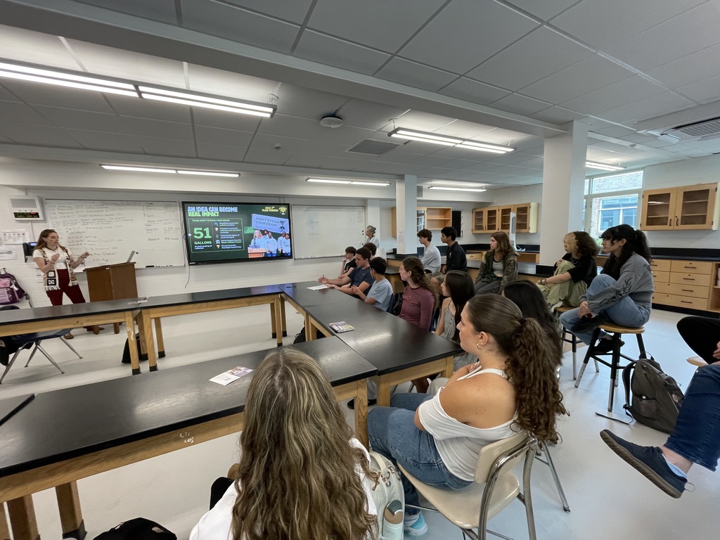 students sitting at tables