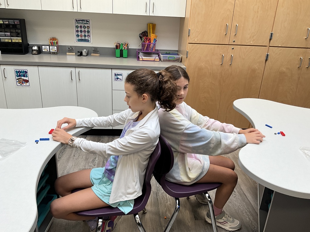 students sitting at table