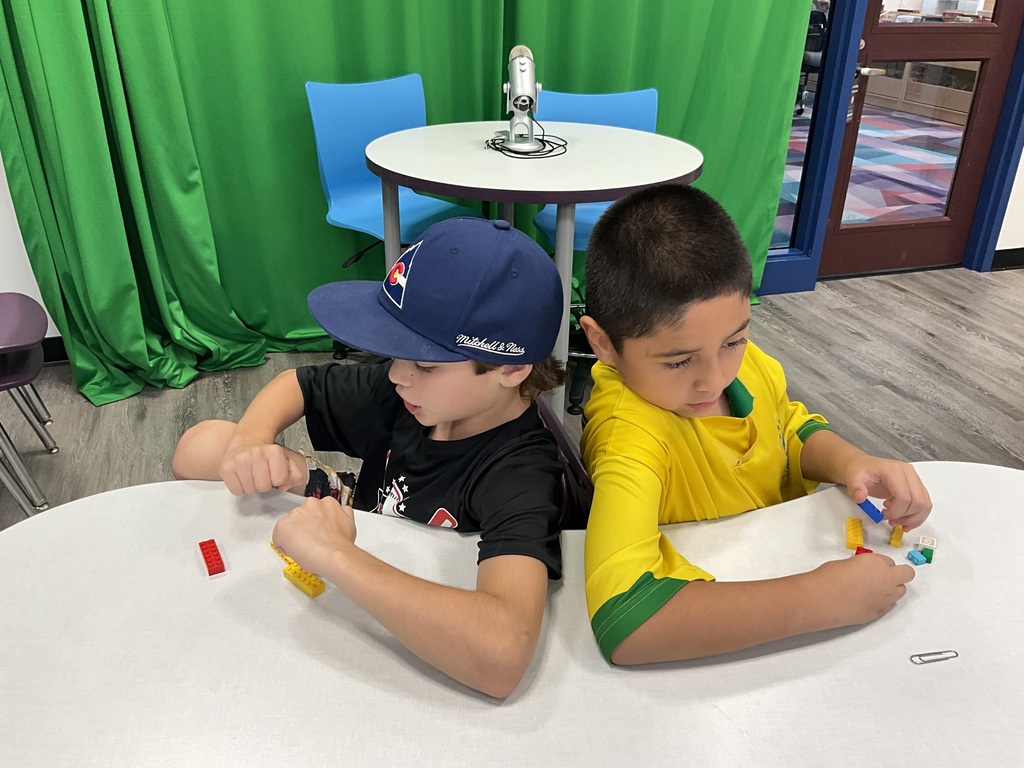 students sitting at desk 