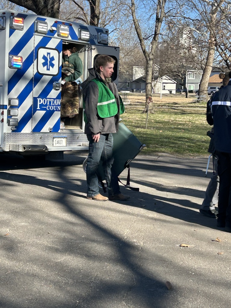 A student prepares to help