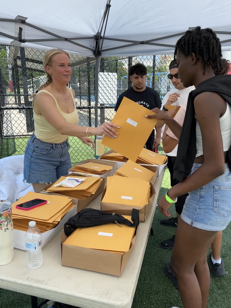 Emilee giving out letters
