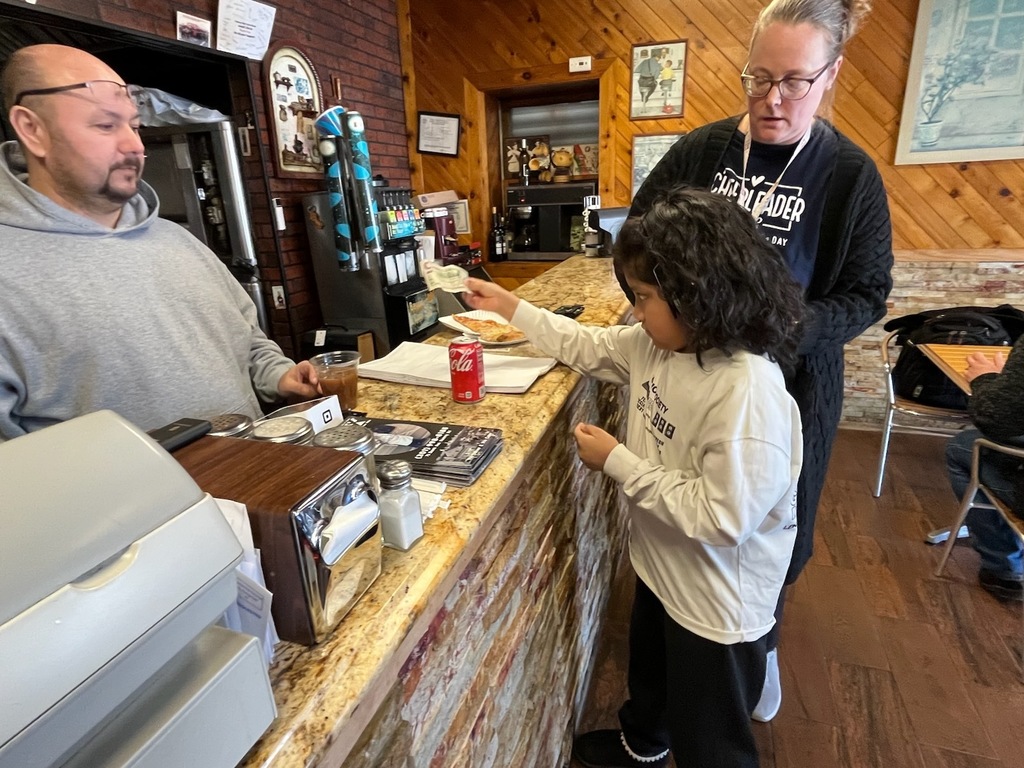Using communication devices at Big Nicks to order Lunch
