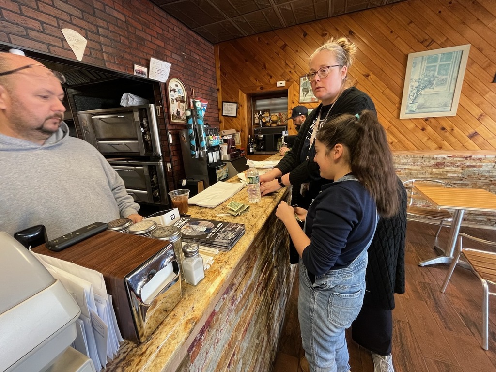 Using communication devices at Big Nicks to order Lunch