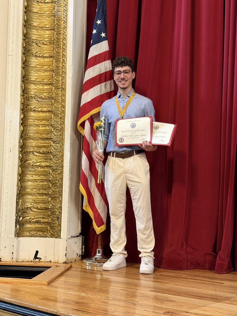 Boy with two certificates